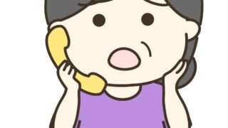 電話応対、電話に困惑する女性